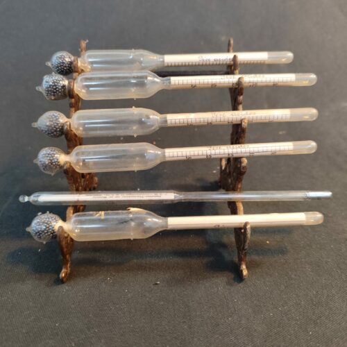 Lot de 5 anciens densimètres au mercure + un thermomètre